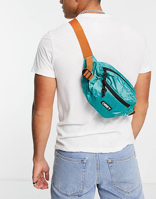 Men Obey commuters bumbag in blue 