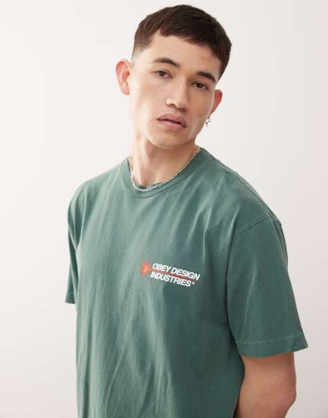 Obey Design Industries – T-Shirt in Dunkelgrün mit Grafik-Logo und Rückenprint - view 1