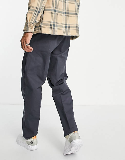 Men Obey estate pleated trousers in navy 