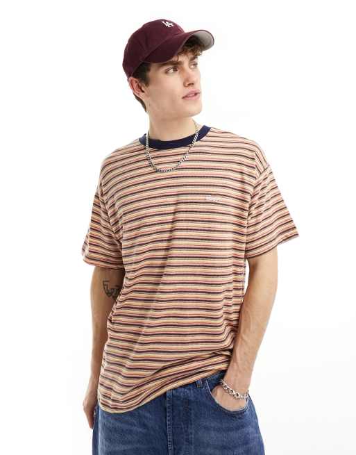Obey - Gestreept T-shirt met korte mouwen en gekleurde randen in Academy oranje multi