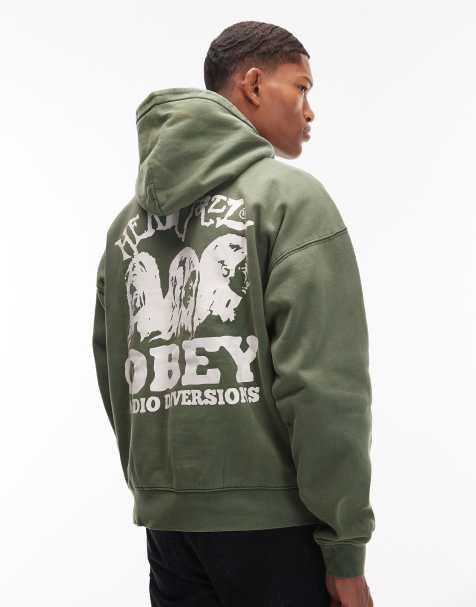 Obey – Grön, boxig huvtröja i dra på-modell med blekt 'Head Jazz'-tryck - view 1