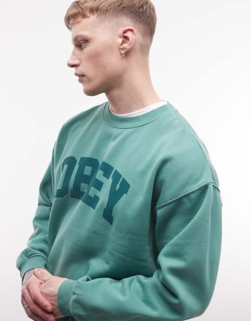 Obey – Grön sweatshirt med rund halsringning och pigmenterad logga i collegestil, 4 av 5