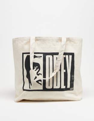 OBEY half icon logo graphic tote bag in off white - view 1