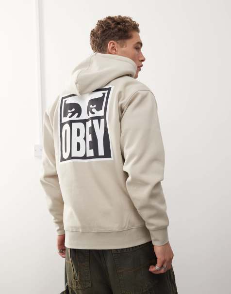 Obey – Kapuzenpullover in Beige mit Augen-Grafik - view 1
