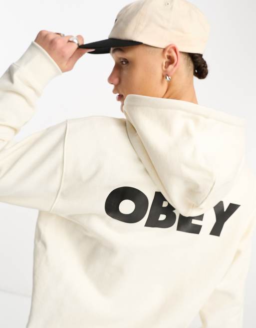 Obey – Kapuzenpullover in Weiß mit auffälligem Logo