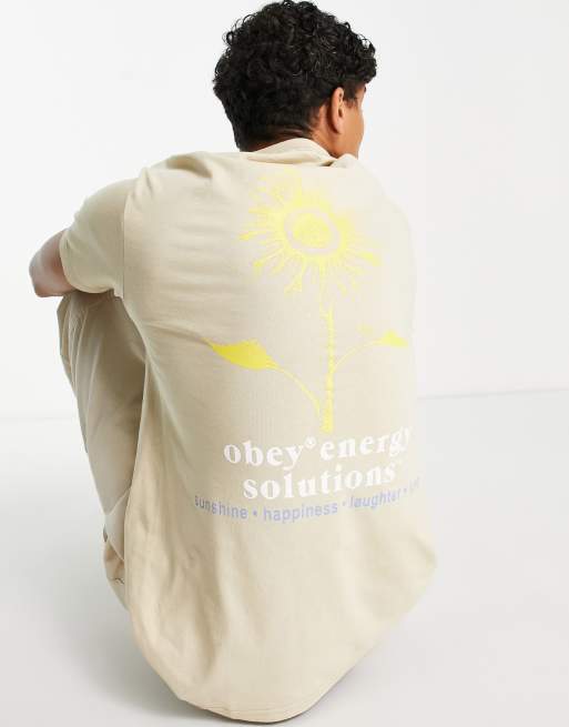 Obey – Kremowy T-shirt z napisem „Energy Solutions”