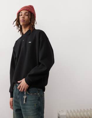 Obey lowercase logo fleece polo in black