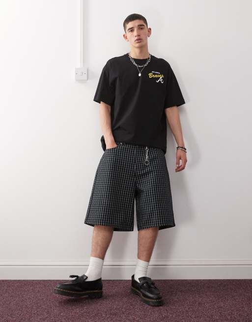Obey - Pantaloncini di jeans ampi nero multicolore con stampa a quadri