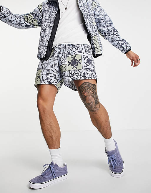 Men Obey pathos print shorts co-ord in blue 