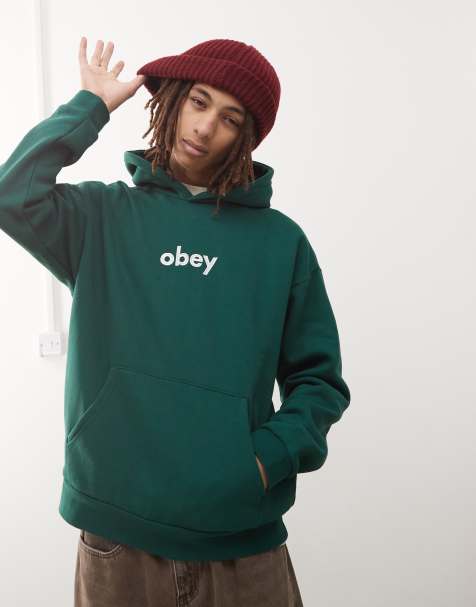 Obey – Schwerer Kapuzenpullover in Dunkelgrün mit Kleinbuchstaben-Logo - view 1