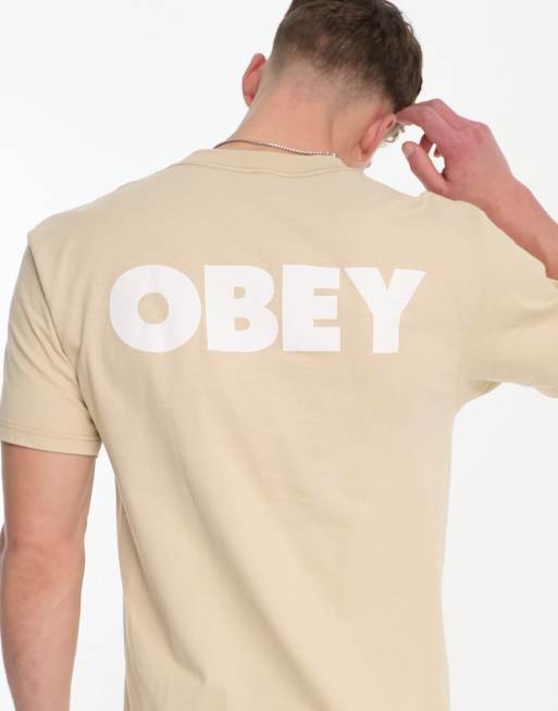 Obey - T-shirt avec imprimé logo large dans le dos - Beige