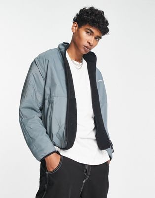 Obey trophy sherpa reversible jacket in black and blue