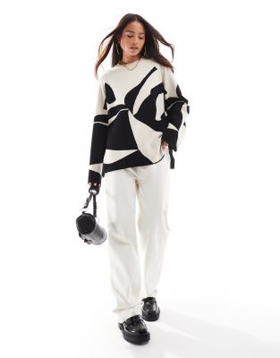 abstract pattern sweater in black and white print