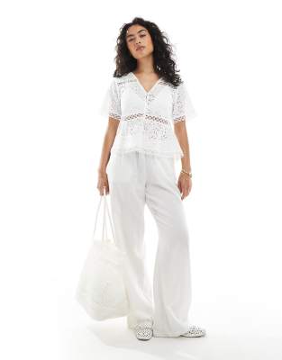 Object Cutwork Embroidered Short Sleeve Peplum Hem Top