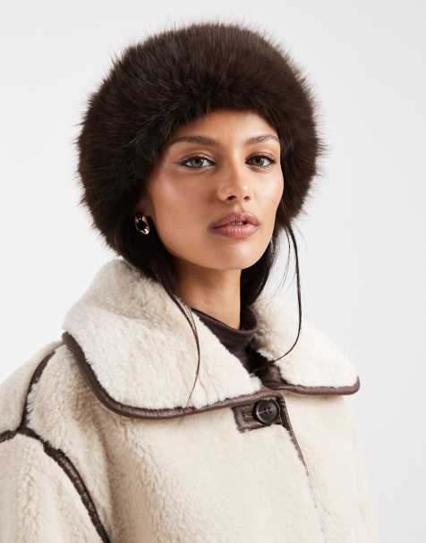 Object faux fur winter hat in brown