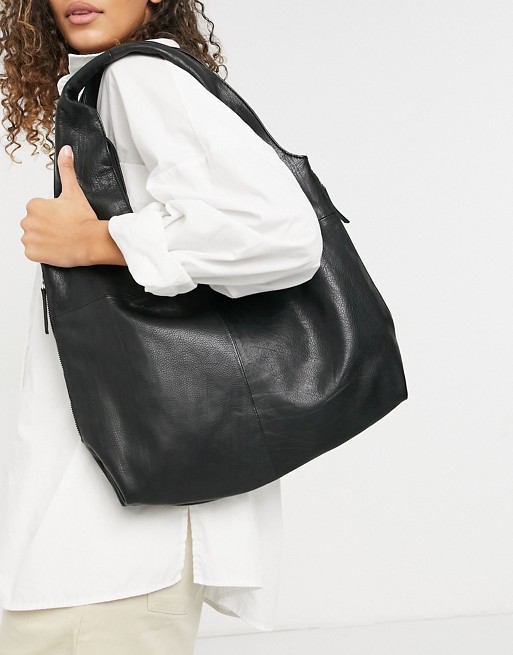 Object leather shoulder bag with zip detail in black