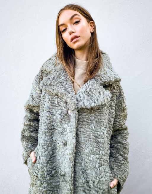 Textured longline store faux fur coat