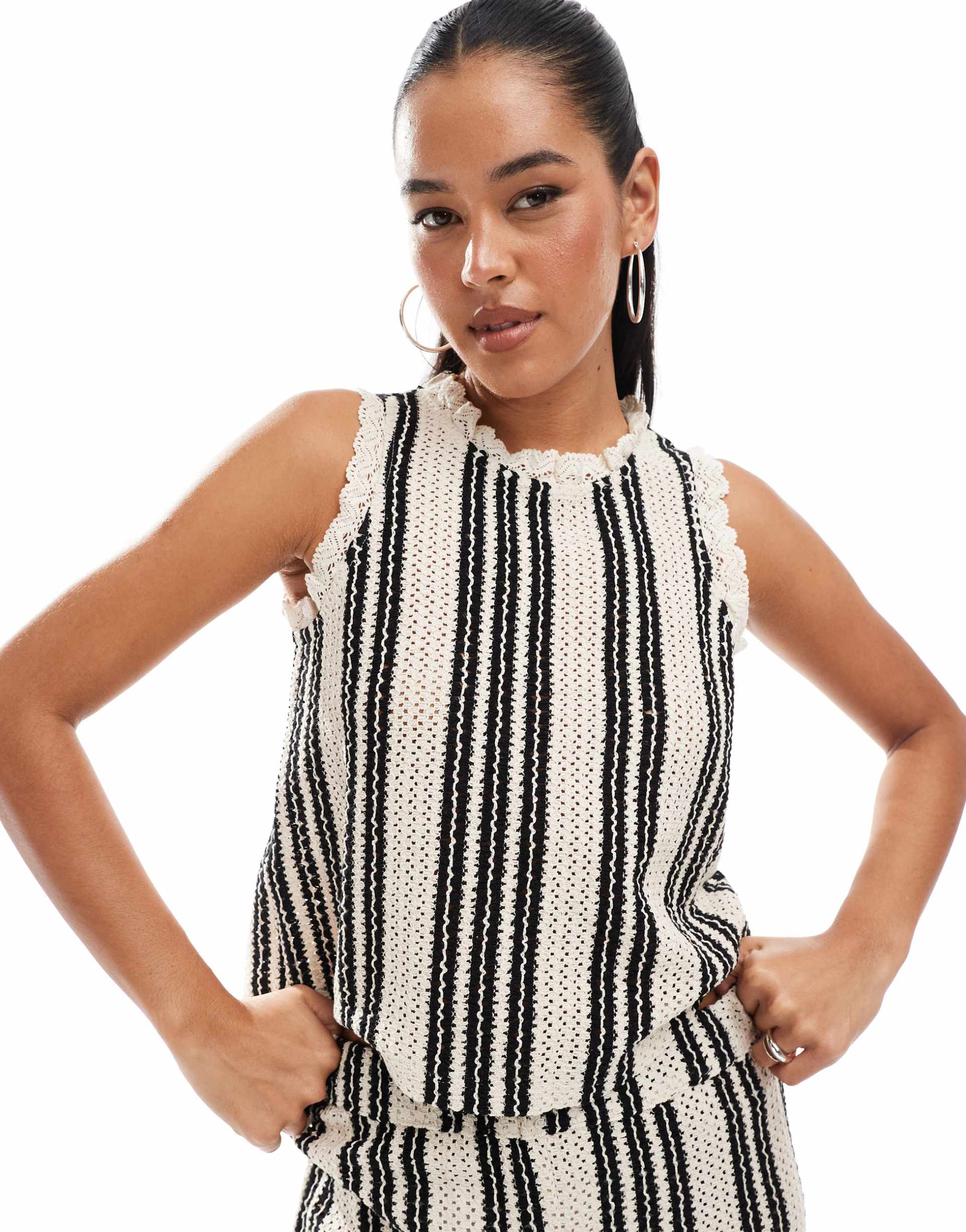 object open knit sleeveless top in black and white stripes - part of a set