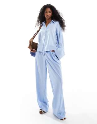 pleat front wide leg pants in light blue - part of a set