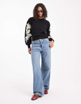 Object Volume Sleeve Sweater With Floral Applique Detailing In Black