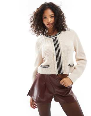 zip up knitted short cardigan in white with contrast detail