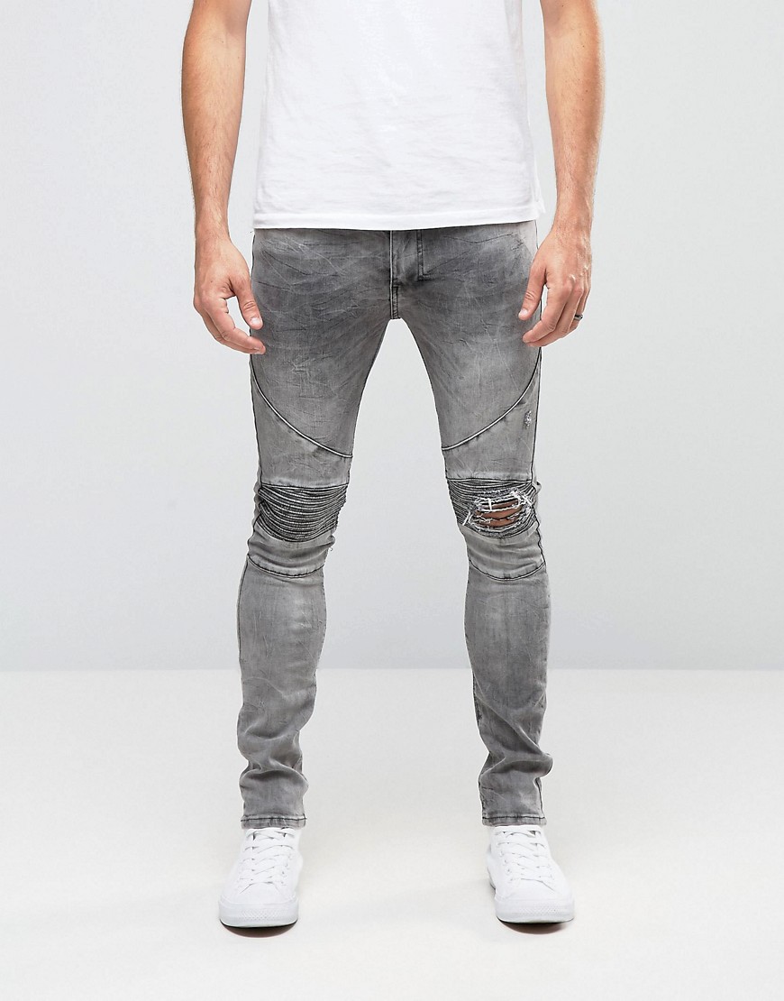 фото Облегающие байкерские джинсы с заплатками на коленях religion-серый