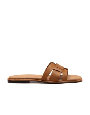  Heath leather slip on flat sandals in tan