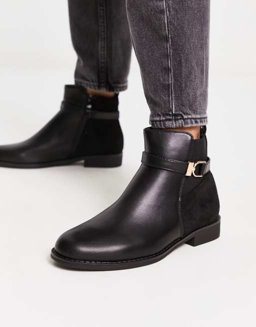 Black buckle ankle hot sale boots