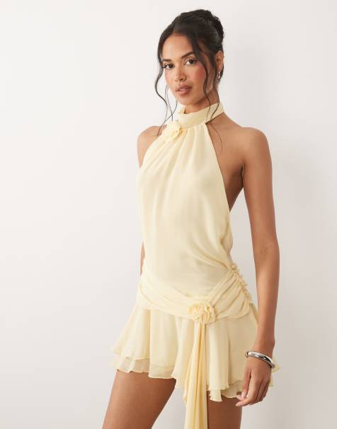 Oh Polly chiffon halter neck rosette detail draped waist mini dress in butter yellow 