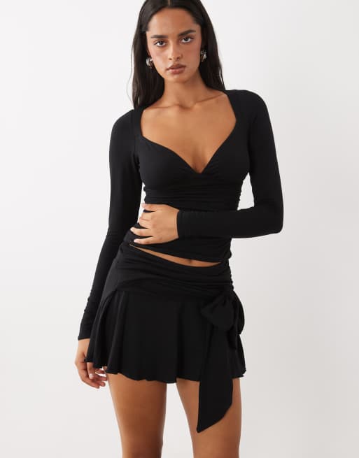 Oh Polly plunge ruched detail top and tie detail mini skirt co-ord in black, 2 of 3