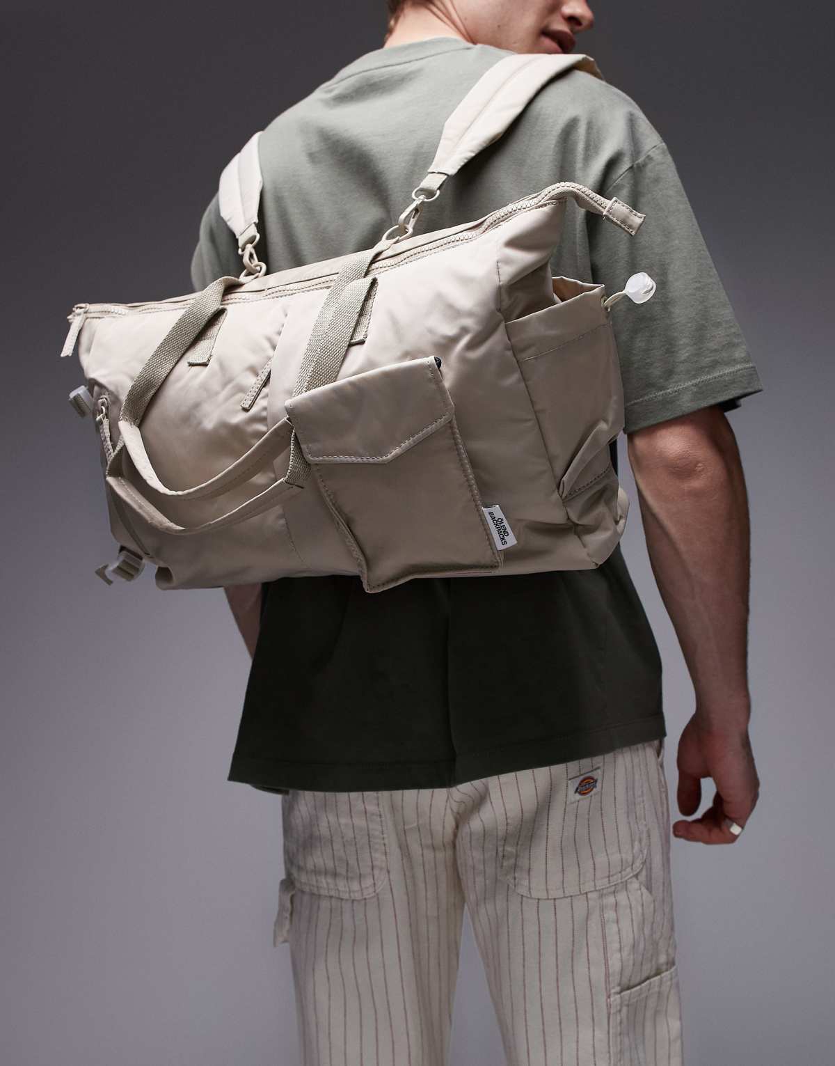 OLEND calypso multiwear pocket detail bag with laptop compartment in sand