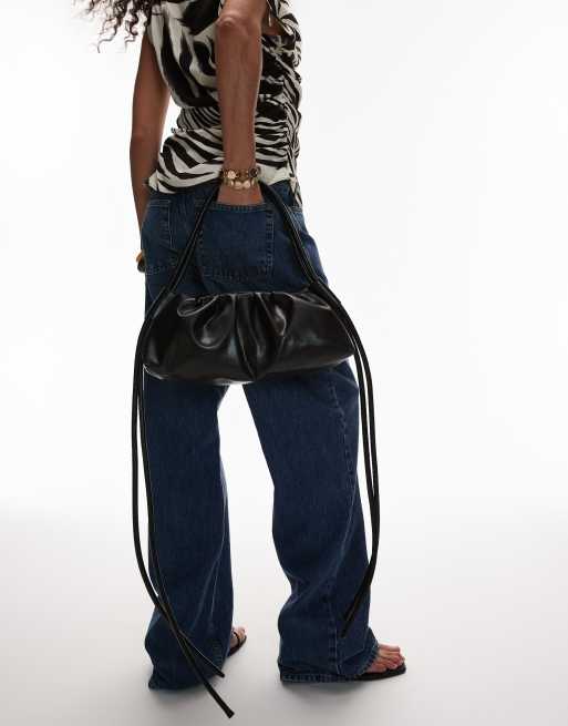 OLEND dumpling elongated shoulder bag in black | ASOS