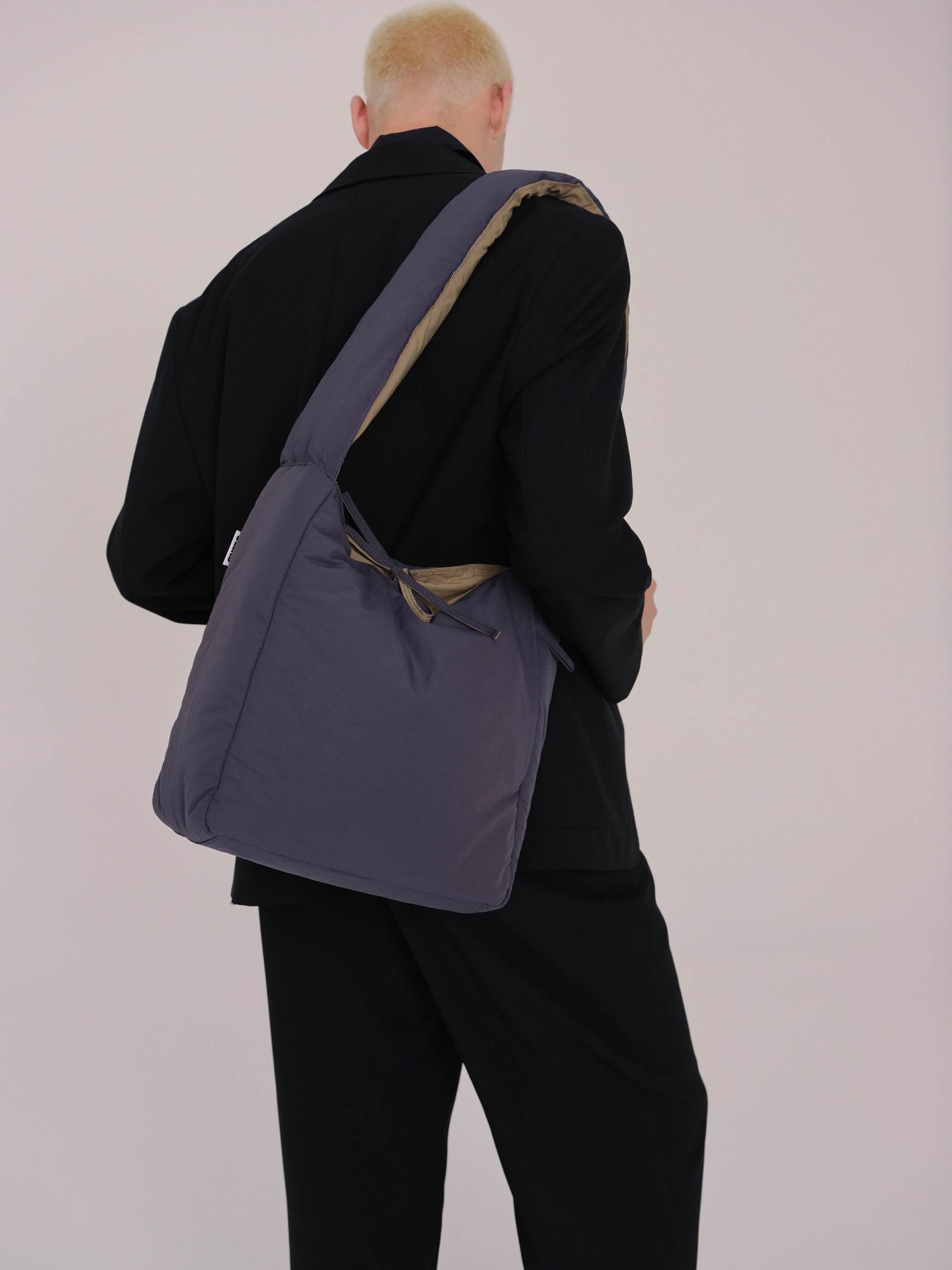 olend luca reversible nylon shoulder bag in charcoal and sand
