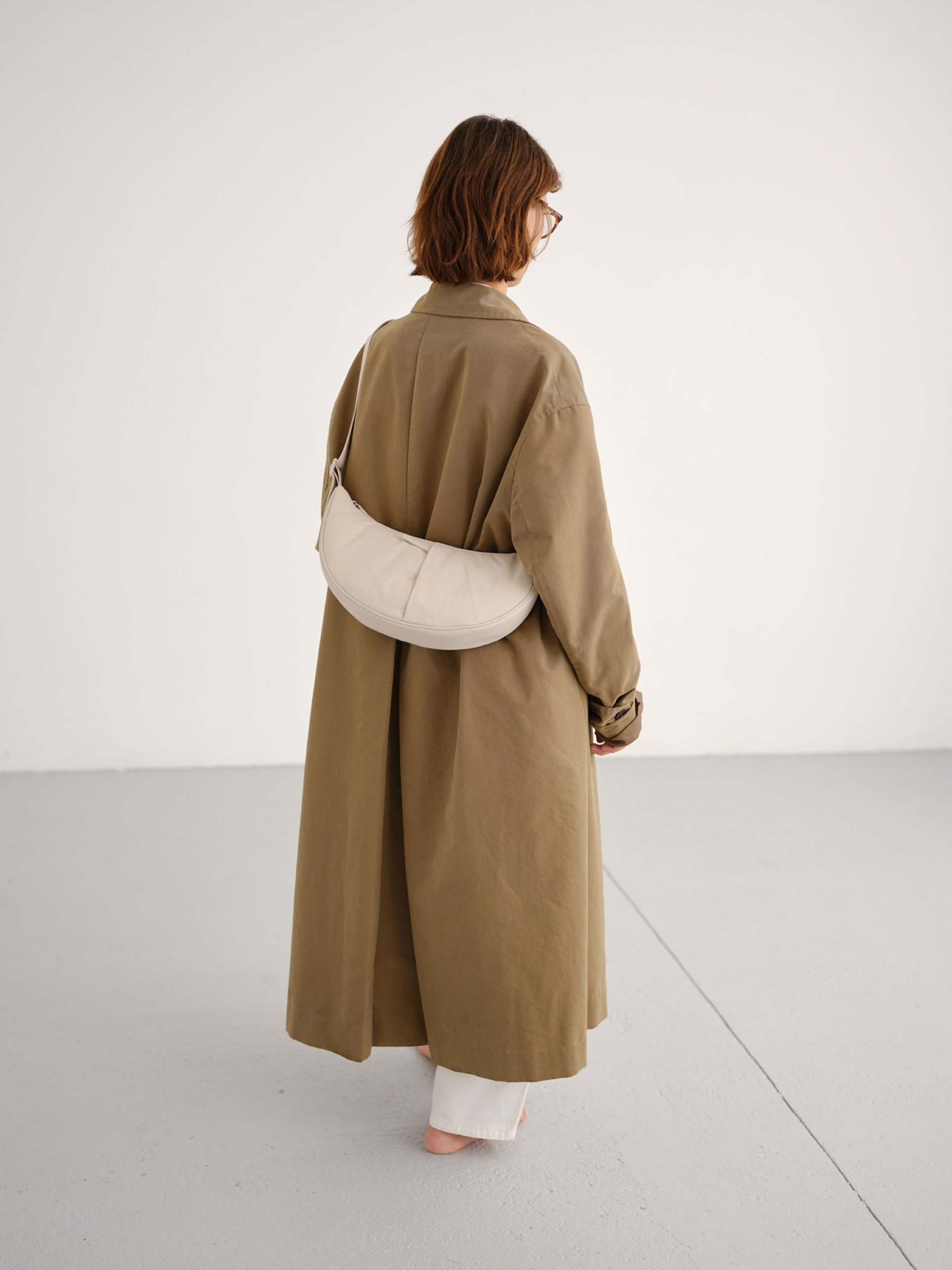 olend moon nylon crescent crossbody bag in sand