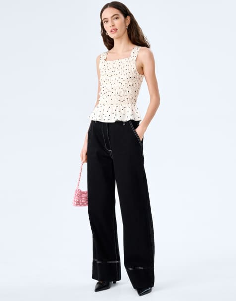 Omnes Tops rain white satin top with peplum frill in polka dot print 