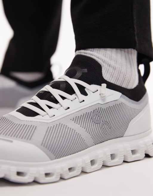 ON Cloud 6 versa all day trainers in white and black, 3 of 5