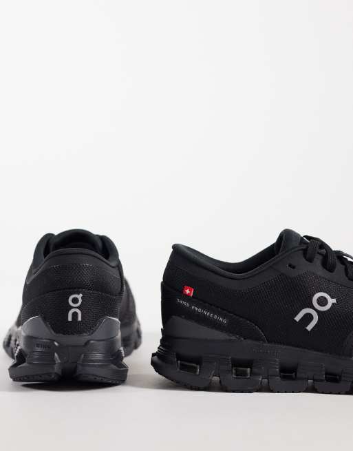 ON Cloud X 4 training trainers in all black, 2 of 5