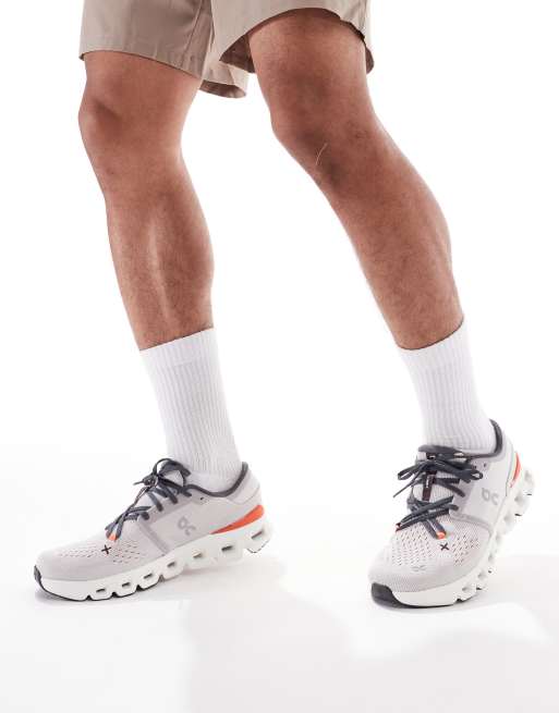 ON Cloud X 4 training trainers in grey and red, 3 of 5
