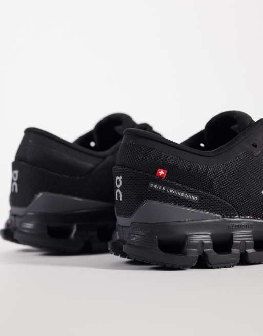 ON Cloud X 4 training trainers in triple black, 2 of 5