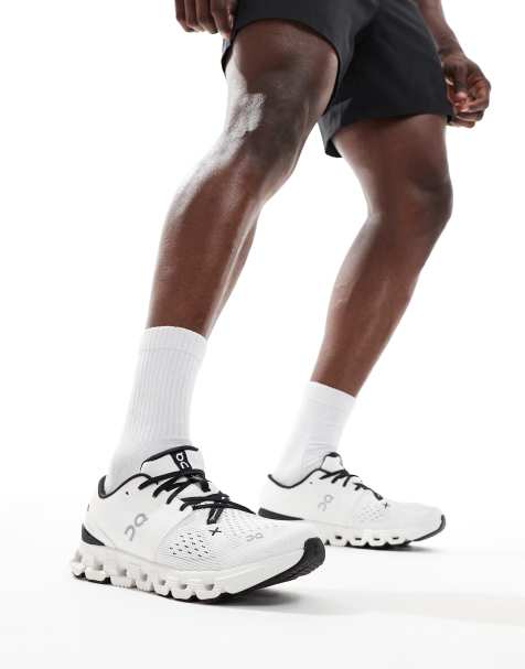 ON Cloud X 4 training trainers in white and black - view 1