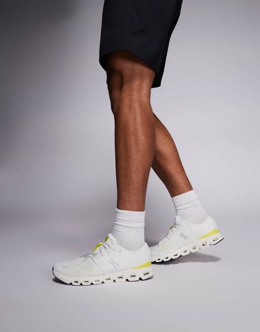 ON Cloud X 4 training trainers in white and lime  , 3 of 5
