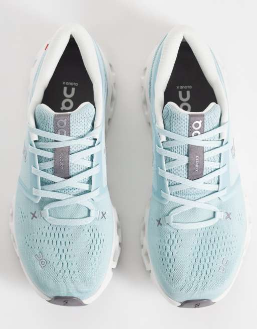 ON Cloud X 5 training trainers in light blue and white, 2 of 5