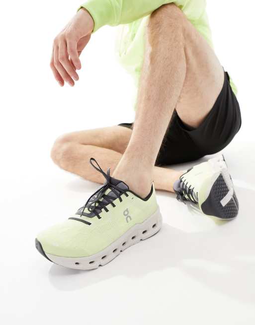 ON Cloudgo running trainers in lime green