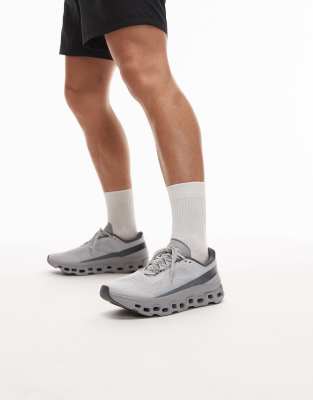 ON Cloudmonster 1 running trainers in grey