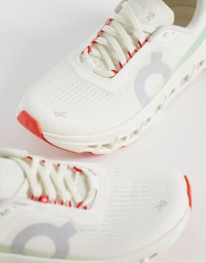 ON Cloudmonster 1 running trainers in white and green