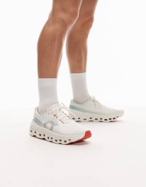 ON Cloudmonster 1 running trainers in white and green