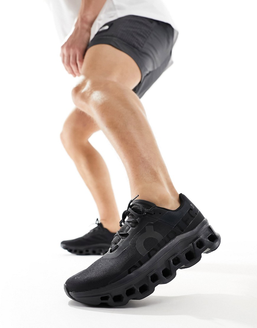 ON Cloudmonster running trainers in all black