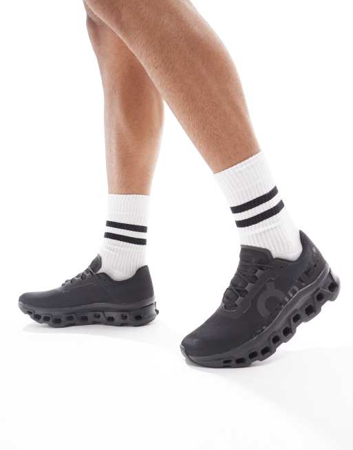  ON Cloudmonster running trainers in all black