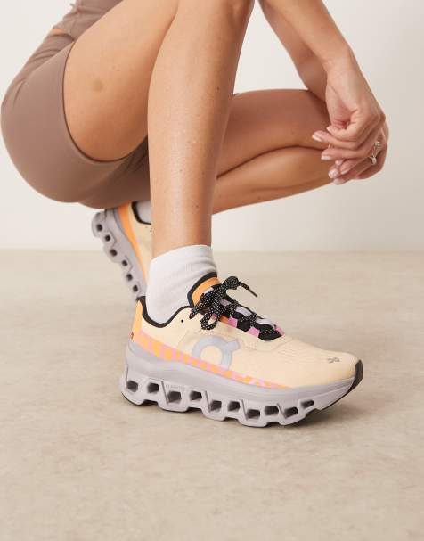 ON Cloudmonster running trainers in coral - view 1