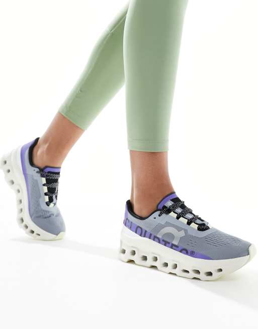  ON Cloudmonster running trainers in white and purple